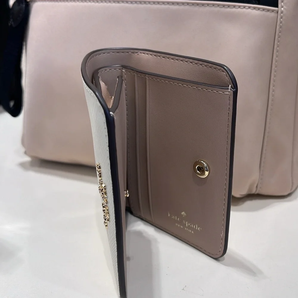 Kate Spade Madison Small Bifold Wallet
Meringue 
NWT - Picture 10 of 16